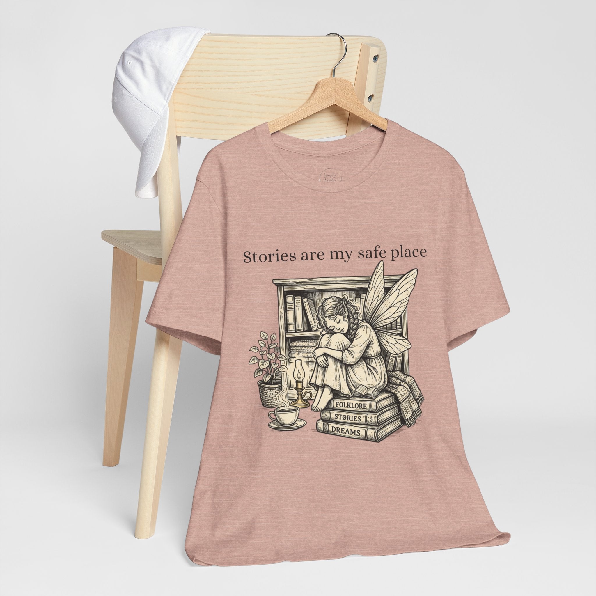 White T-shirt featuring the "Stories Are My Safe Place" fairy reading booklover design, perfect for book enthusiasts.