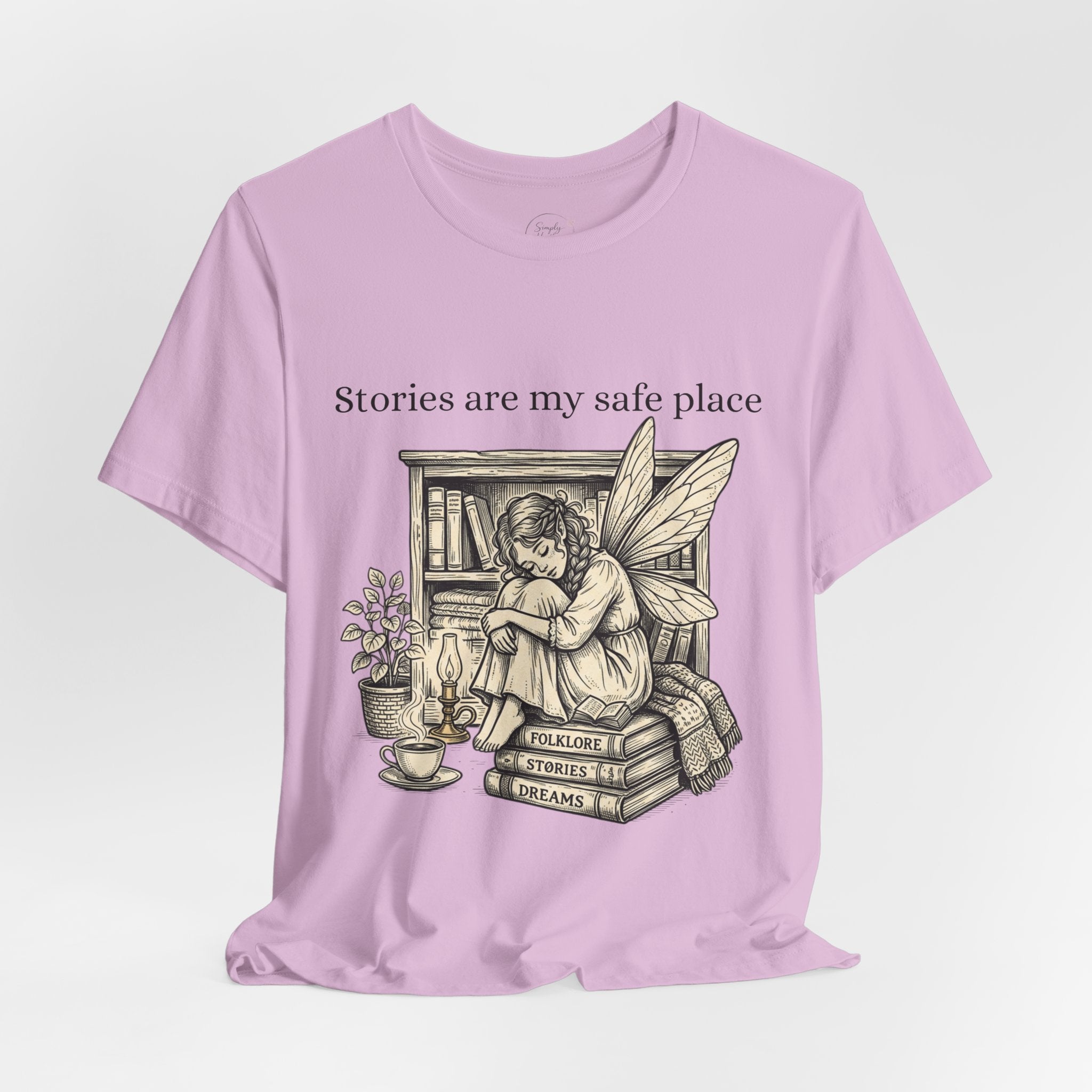 Fairy reading booklover T-shirt featuring "Stories Are My Safe Place" print, casual graphic tee for book lovers and fairy fans.