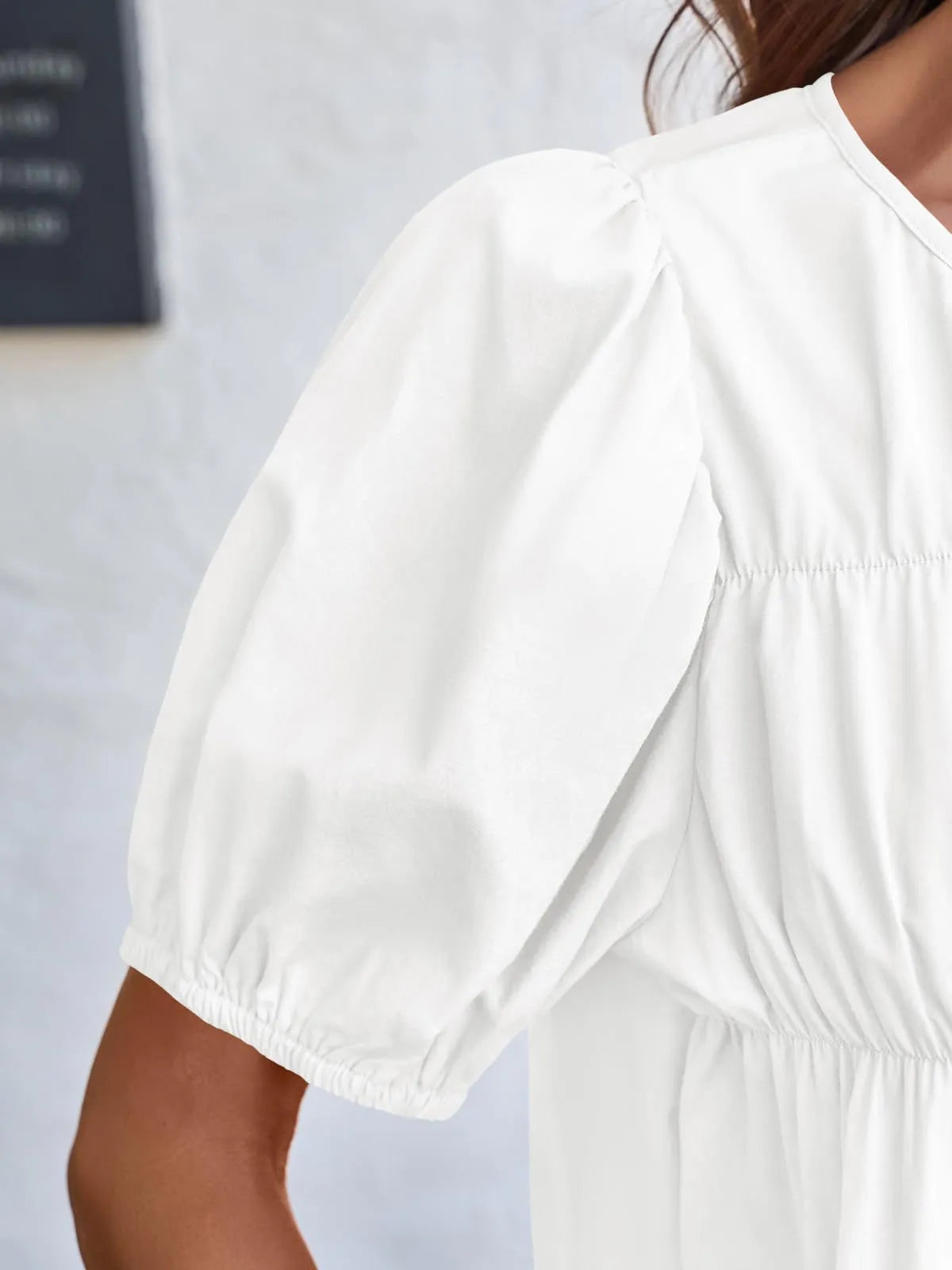 Soft Meadow Silhouette puff sleeve tiered cottage blouse by Trendsi, featuring ruffled puff sleeves and a flowy, layered design.
