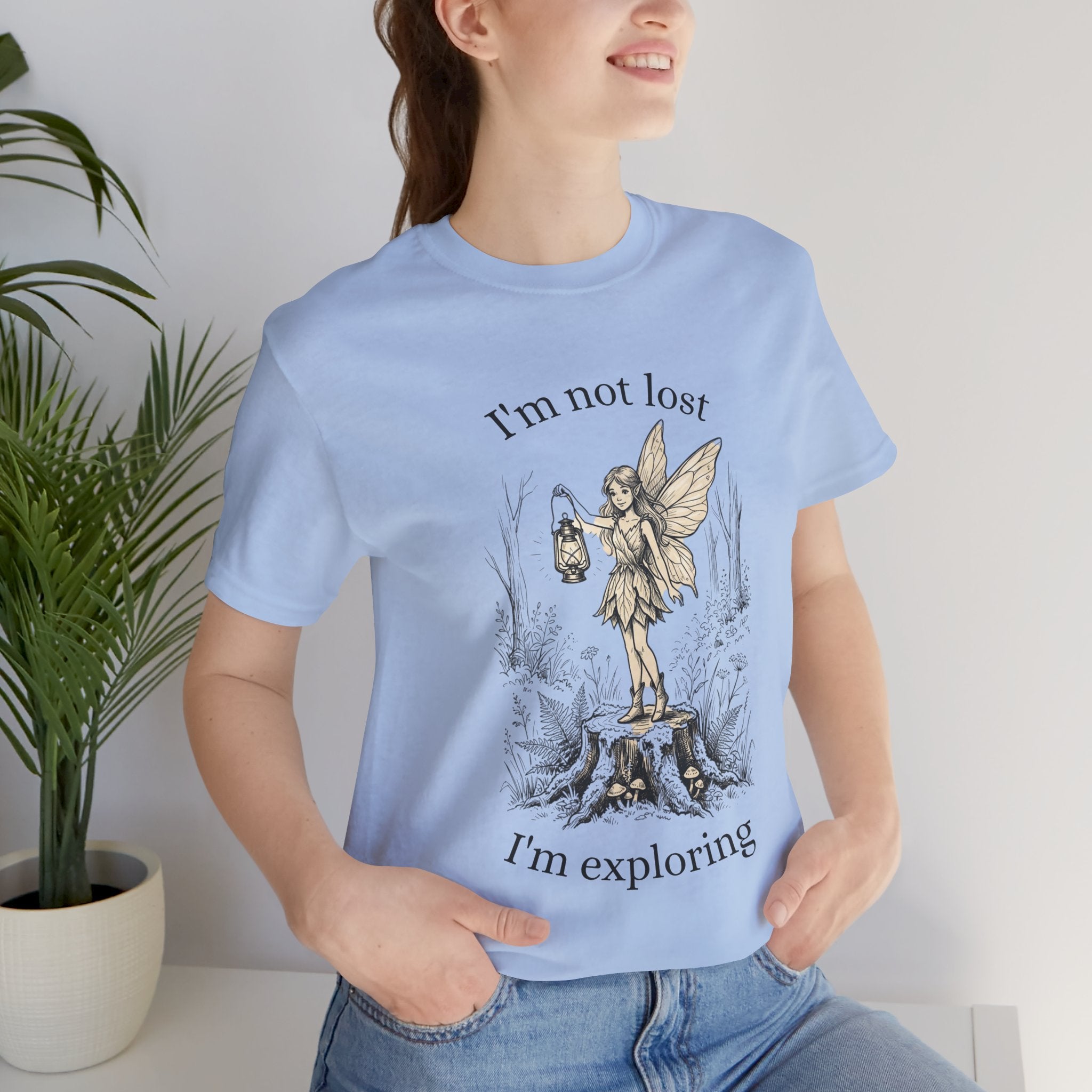 Fairy Exploration Tee with "I’m Not Lost, I’m Exploring" graphic T-shirt in soft fabric, featuring whimsical fairy design.