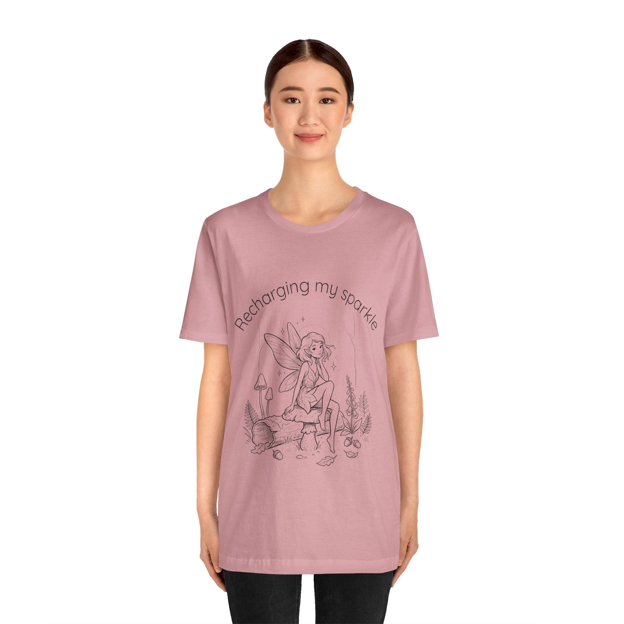 Vintage fairy graphic T-shirt with "Recharging My Sparkle" slogan, featuring whimsical fairy illustration, by Printify