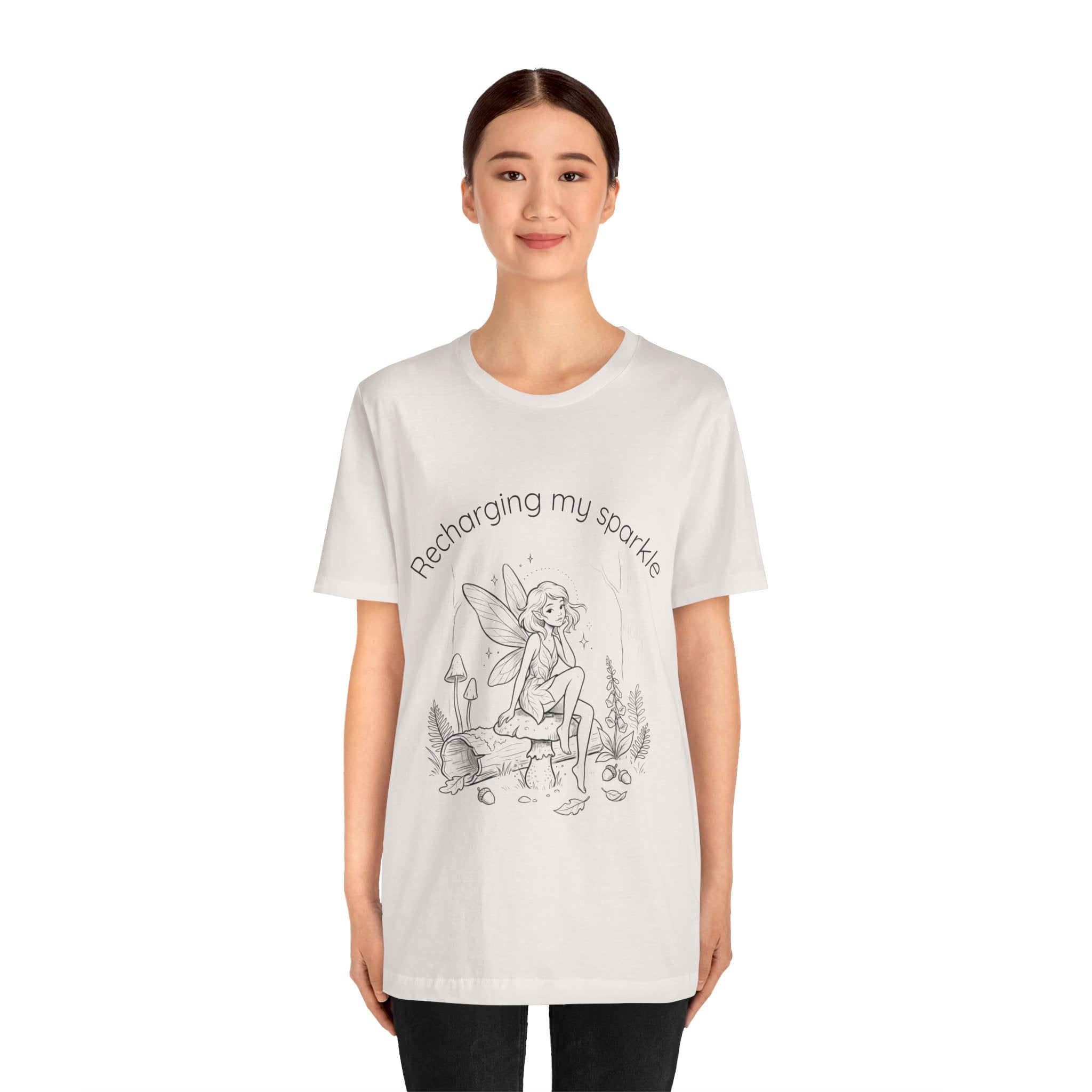 Vintage fairy graphic T-shirt with "Recharging My Sparkle" slogan, printed by Printify, featuring a whimsical fairy design.