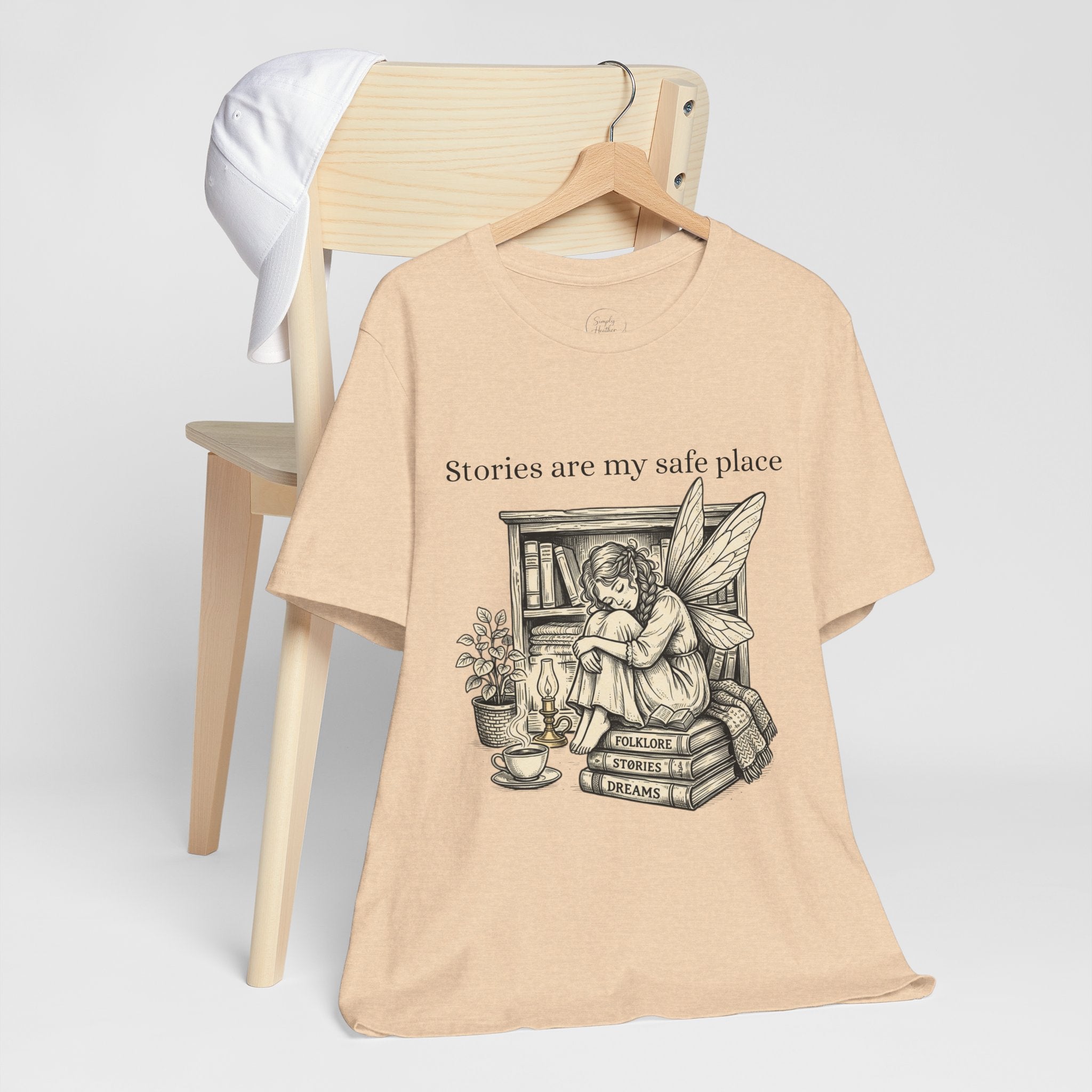 Fairy reading booklover T-shirt featuring "Stories Are My Safe Place" slogan, casual fit, printed by Printify.
