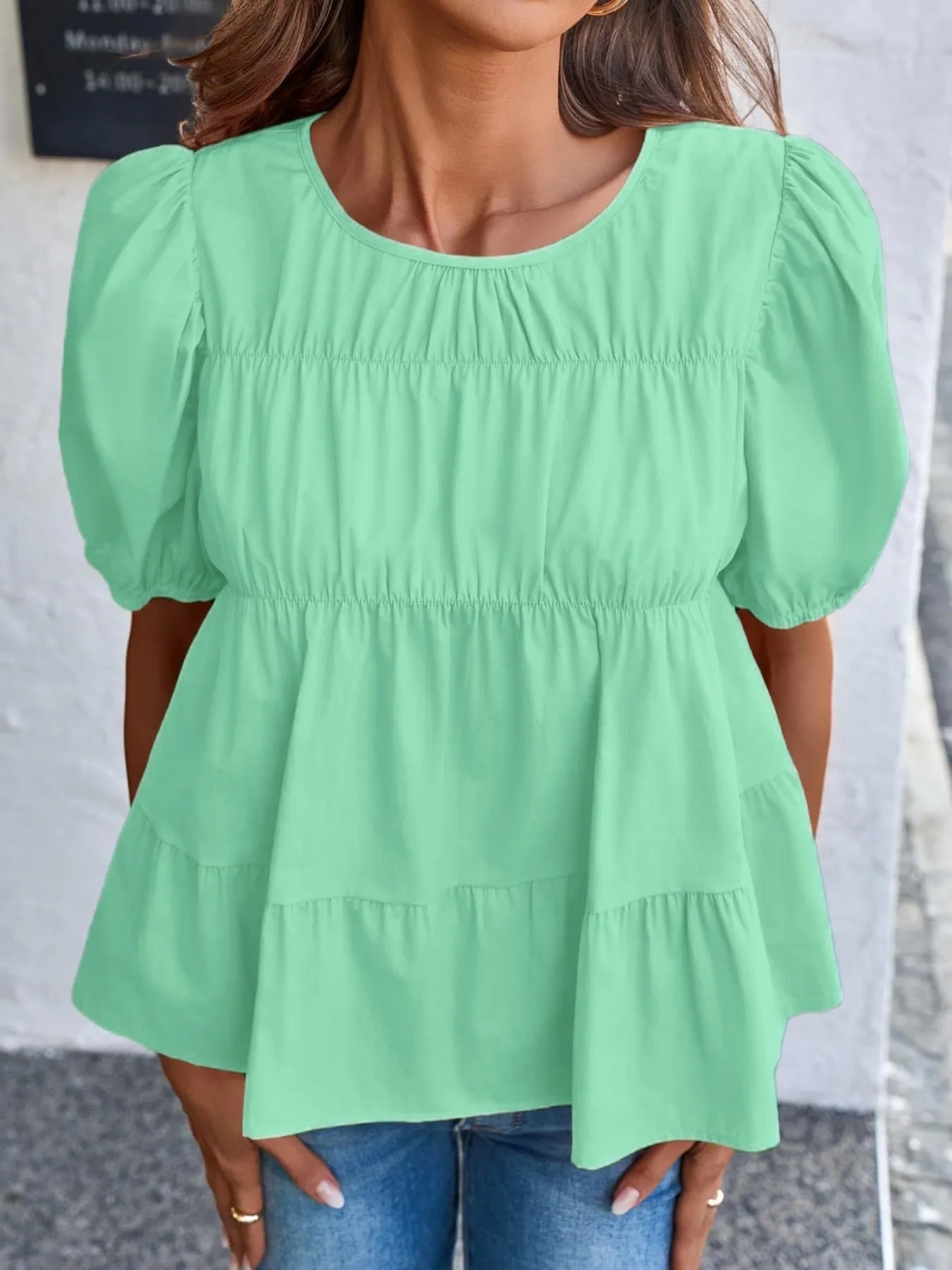 Soft Meadow Silhouette puff sleeve tiered cottage blouse by Trendsi, featuring lightweight fabric and feminine design.