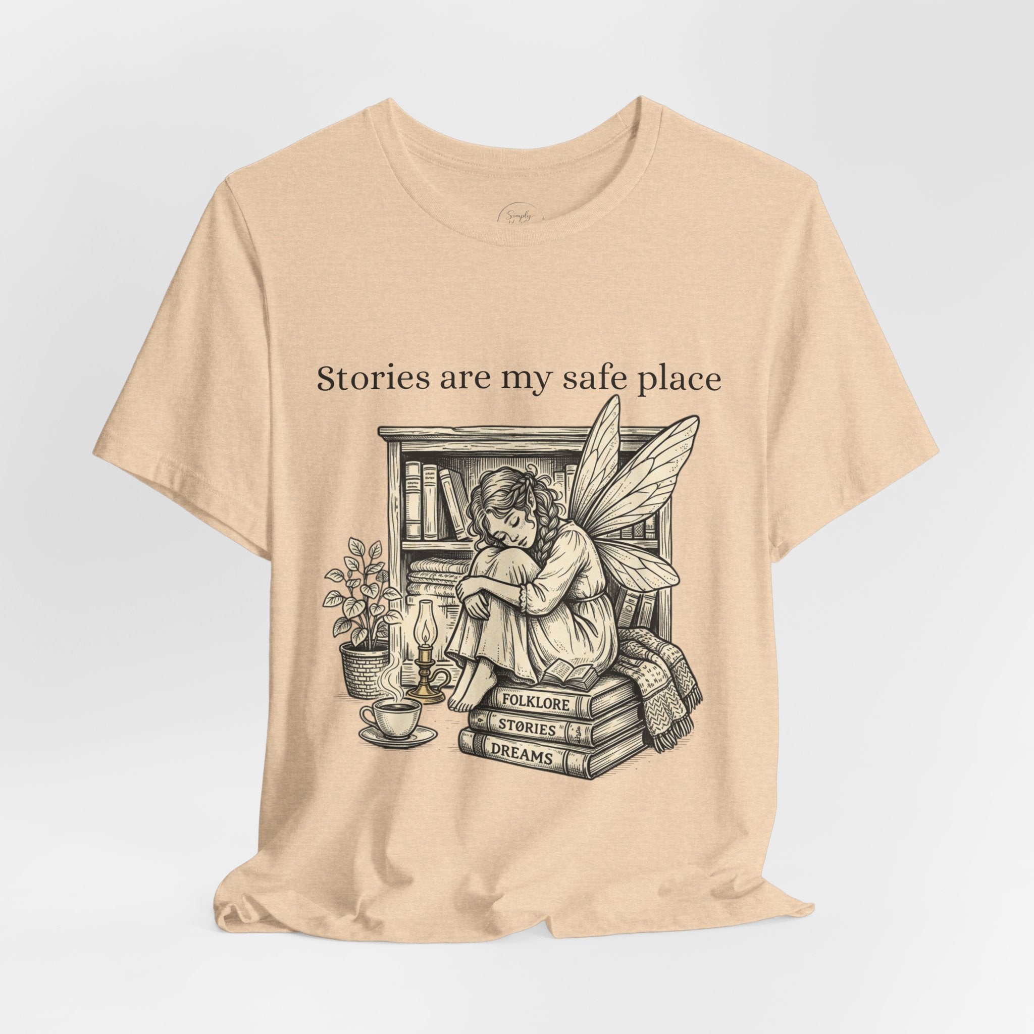 White fairy reading booklover T-shirt with "Stories Are My Safe Place" print, casual fit, worn by a person with long hair.