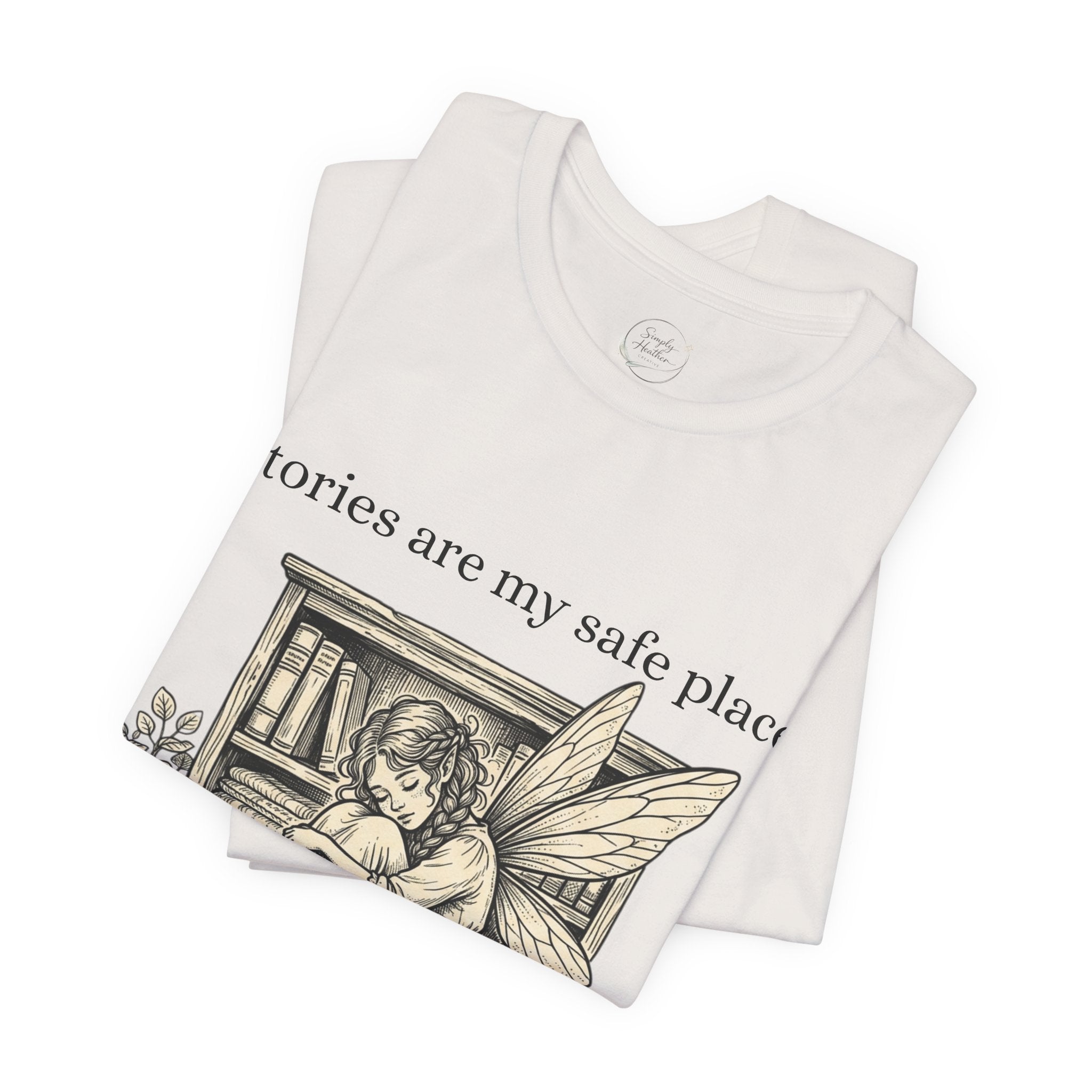 Fairy reading booklover T-shirt with "Stories Are My Safe Place" slogan, soft cotton fabric, casual fit, Printify brand.