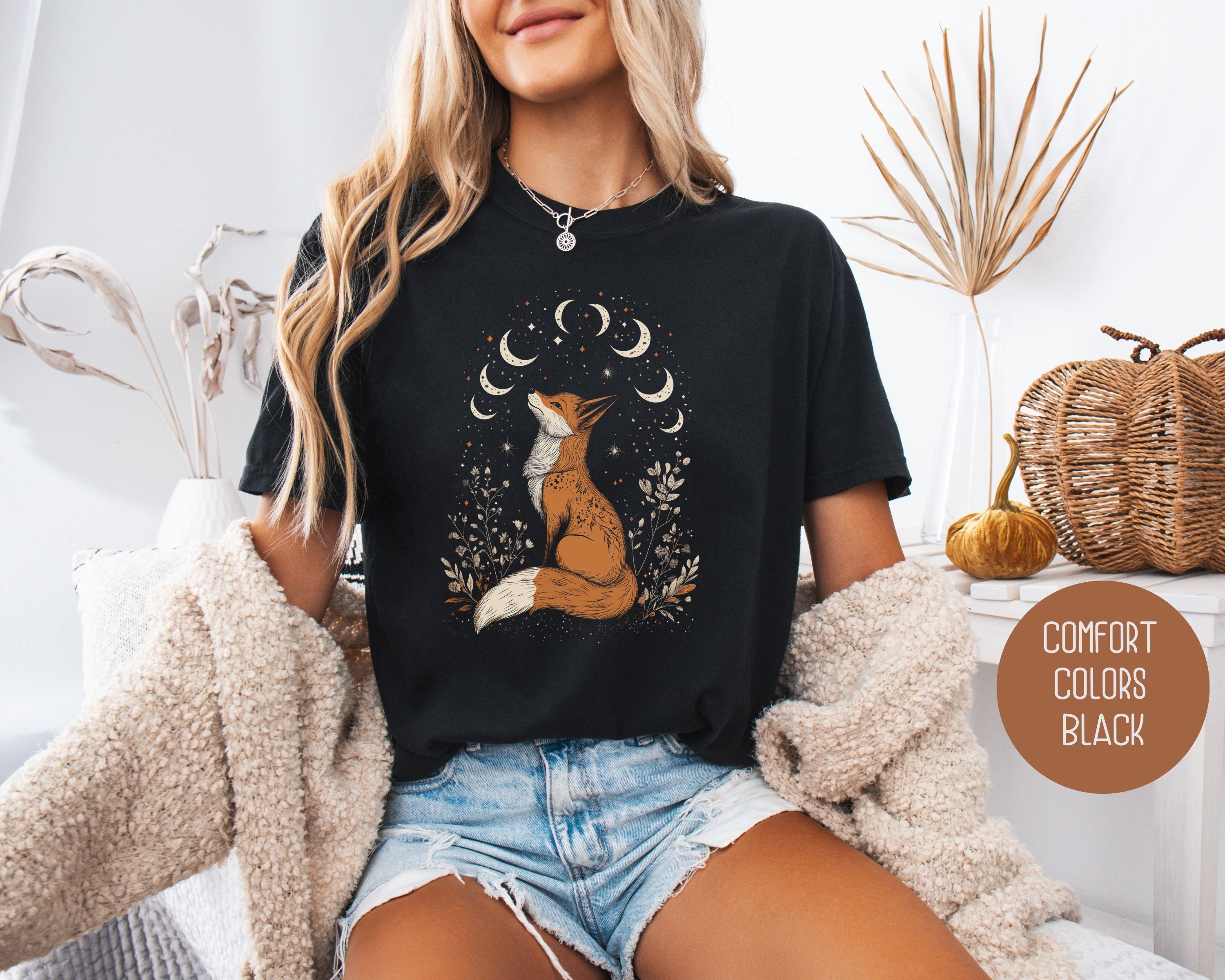 Black Celestial Fox Cottagecore Comfort Colors T-Shirt featuring a whimsical fox design and celestial motifs.