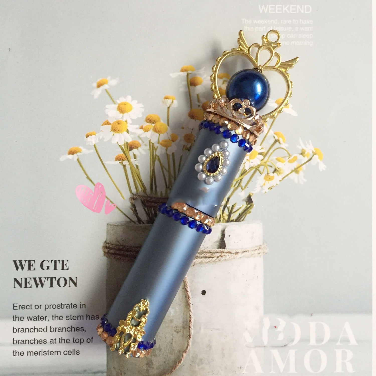 Blue Sailor Moon heart-shaped glass perfume bottle by 24 Hour Crafts, ornate collectible fragrance vessel with intricate design.
