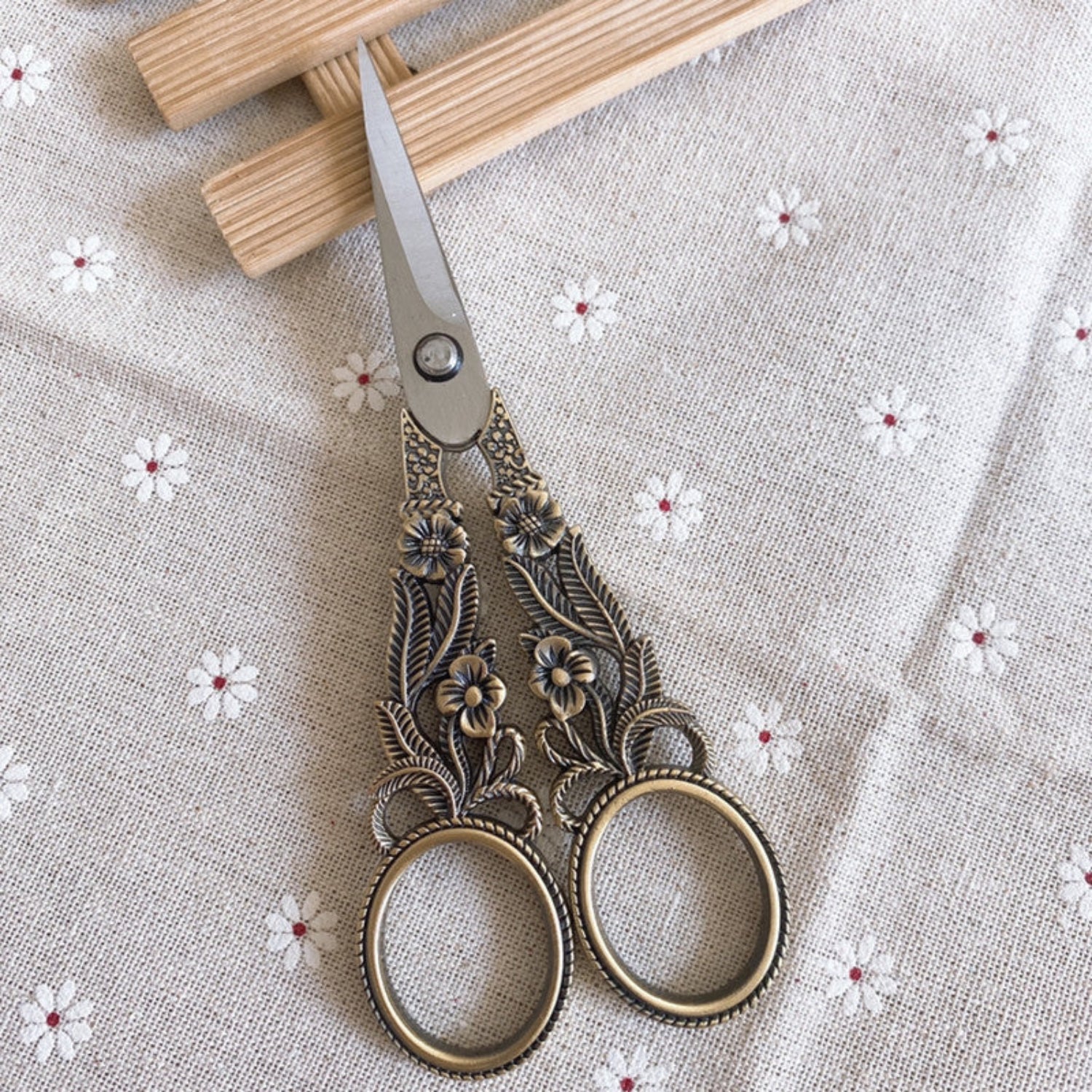 Bronze vintage floral scissors with daffodil design, ideal for embroidery and craft projects from 24 Hour Crafts.