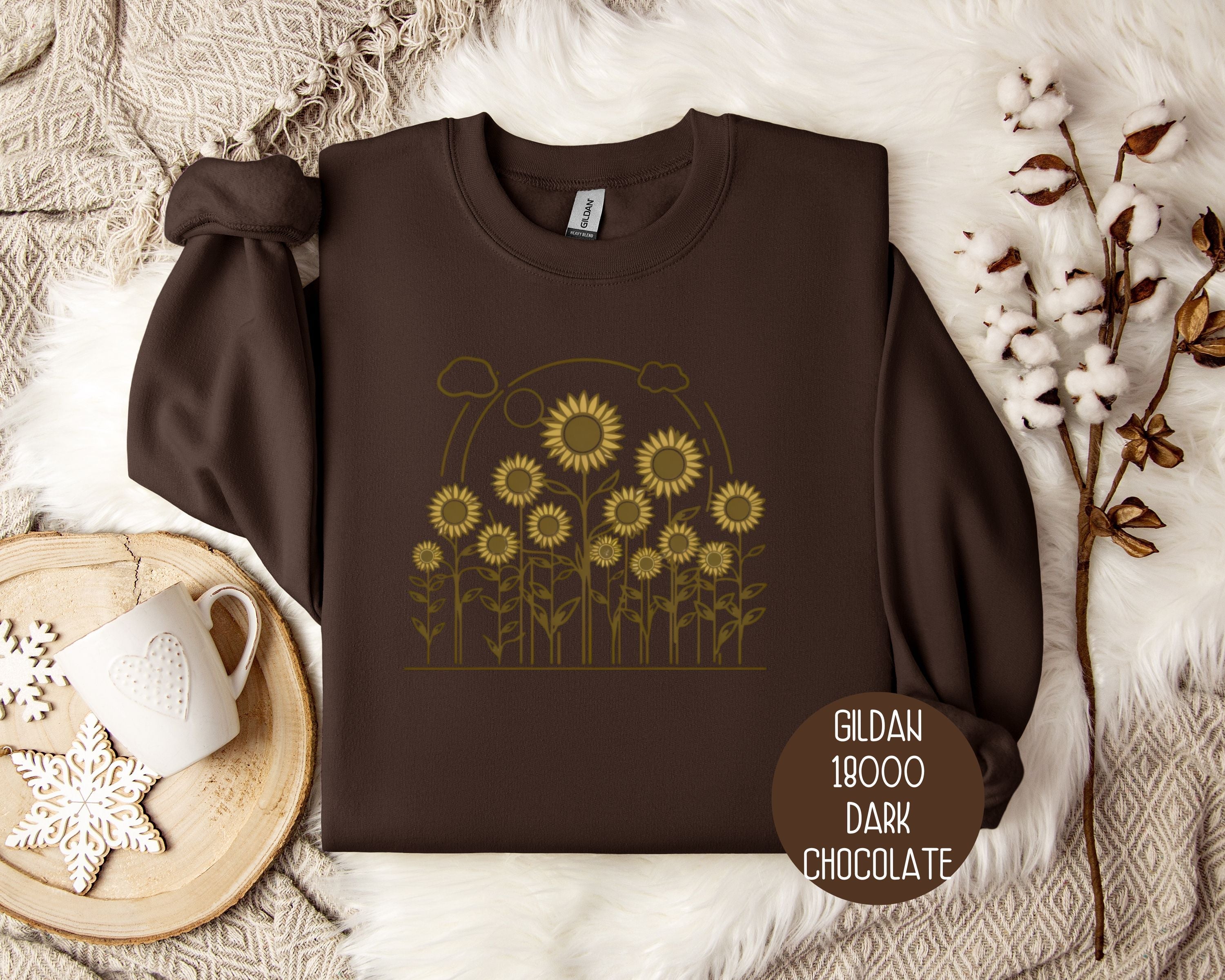 Dark chocolate vintage sunflower cottagecore sweatshirt by CreativeSpecialTs featuring a cozy, floral-inspired design.