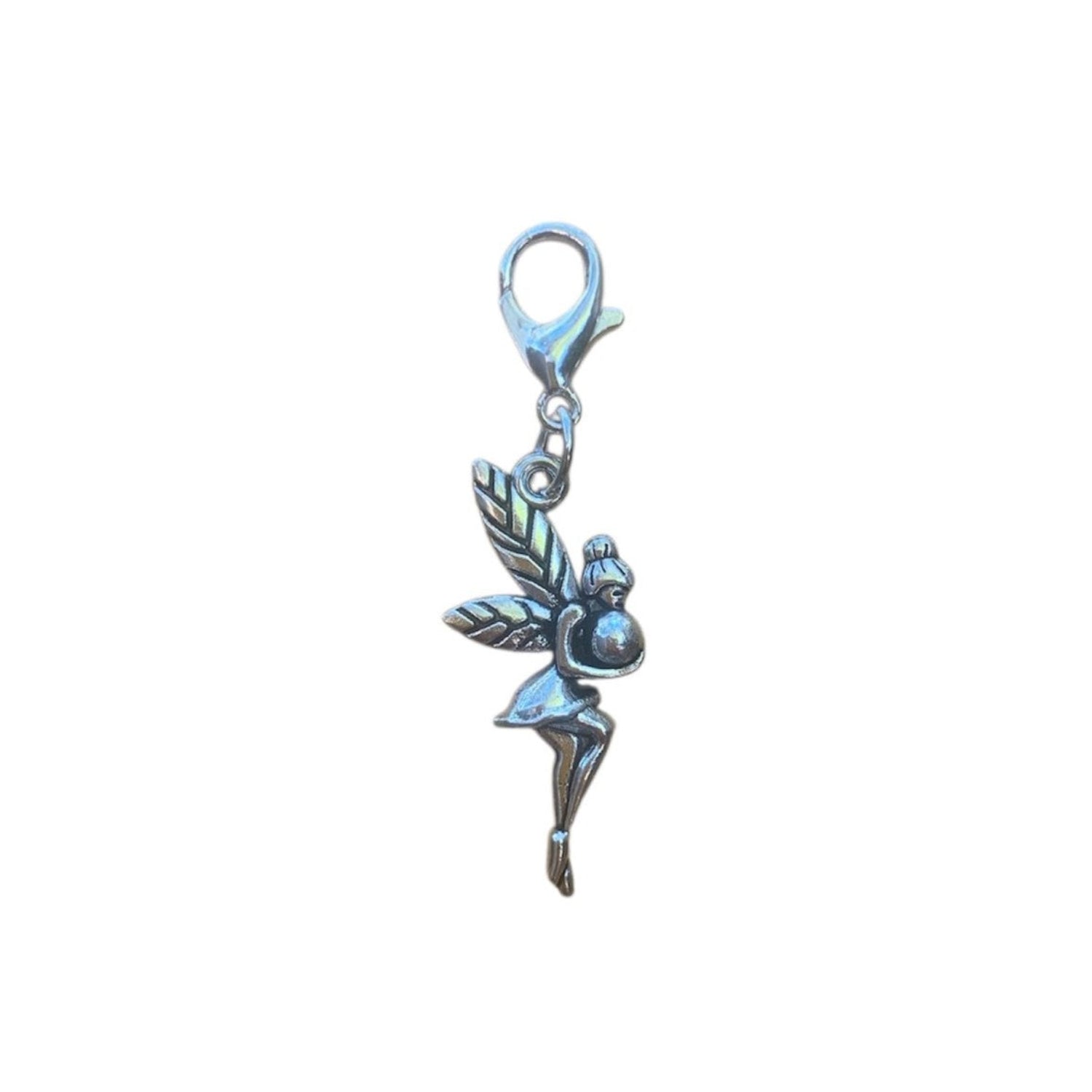 Silver-tone Lyria fairy charm jewelry piece with a 1.5-inch fairy figure and clip, designed by i.am.gretchen.