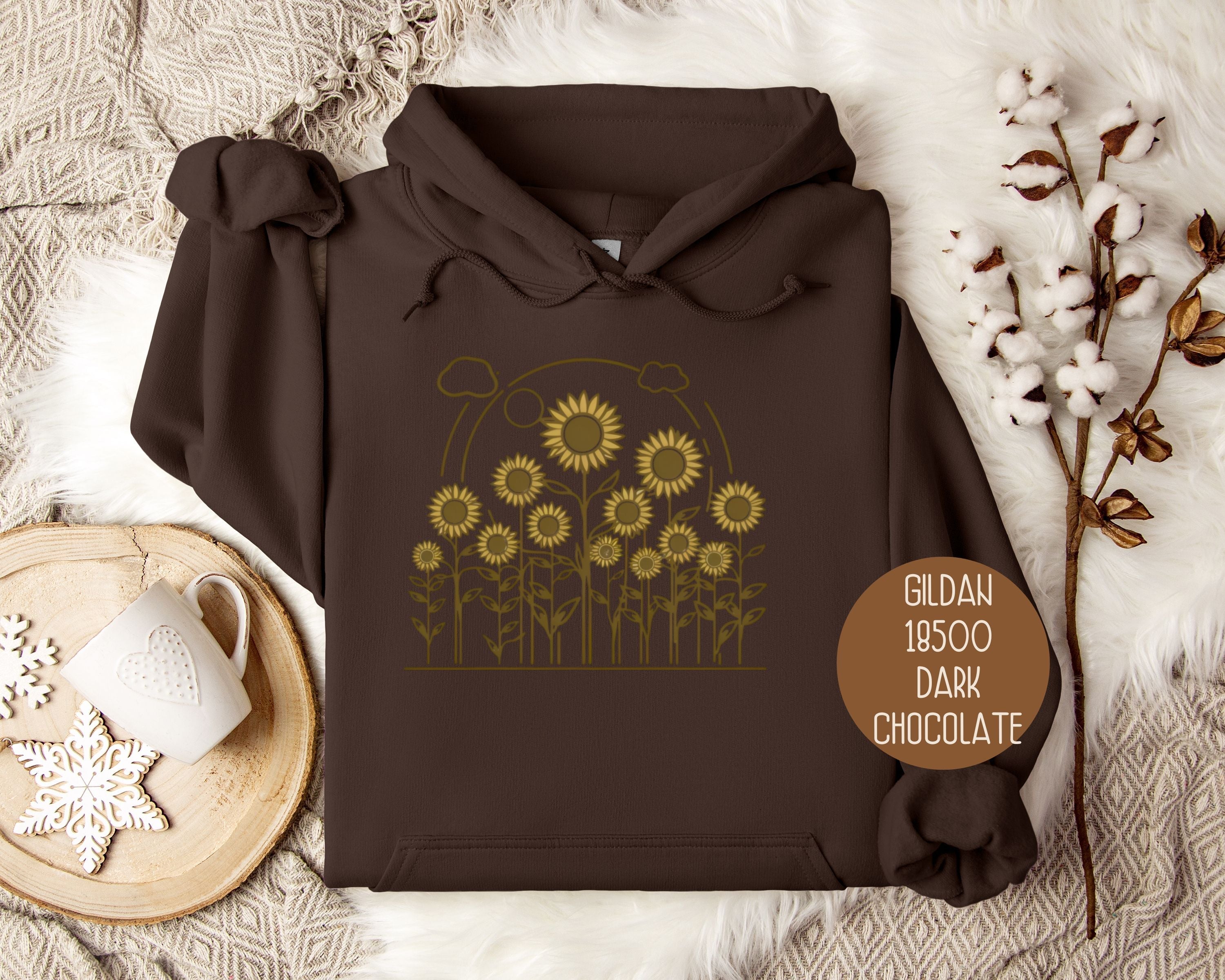 Dark chocolate hoodie featuring a golden cottage sunflower design, from CreativeSpecialTs. Front view of the sunflower hoodie.