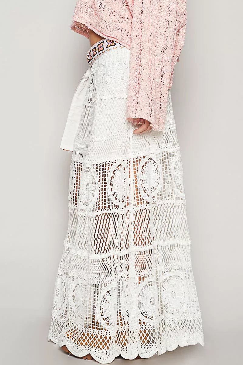 Side view of Hearthside Cottage crochet skirt by Trendsi, featuring intricate crochet detailing and a flowing, boho-inspired design.