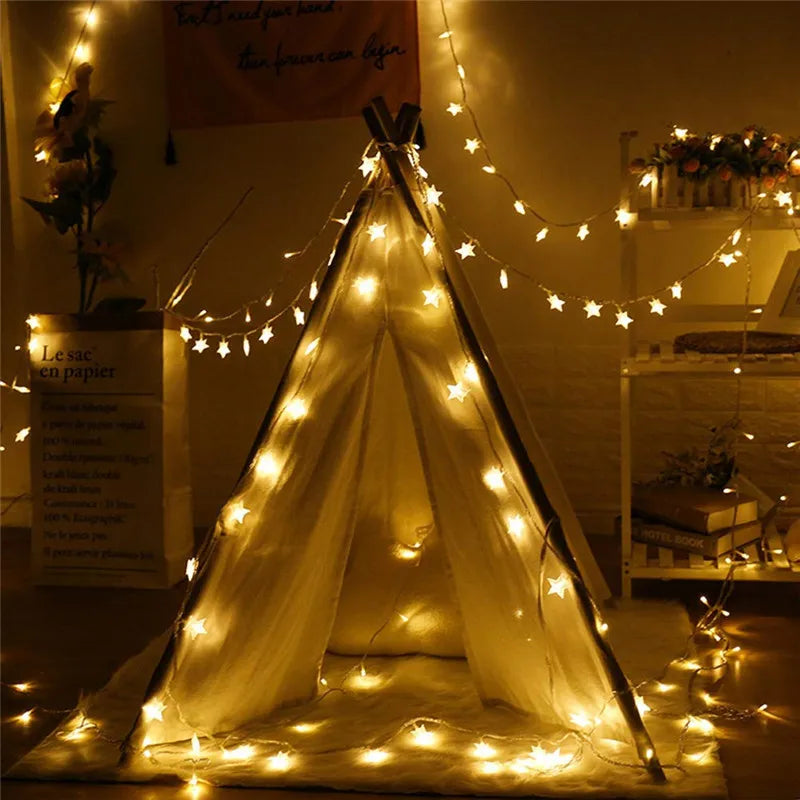 Hollowpath Startrail LED string lights with glowing star shapes, perfect for creating an enchanted ambiance in tents or indoor spaces.
