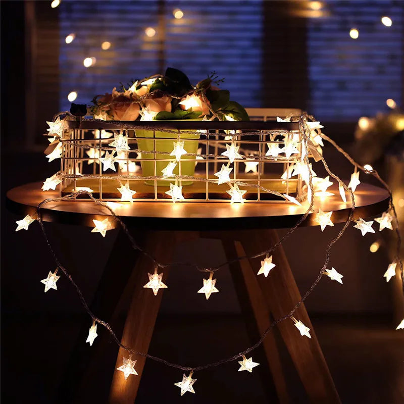 Hollowpath Startrail LED string lights with glowing star-shaped bulbs, perfect for enchanting home or outdoor decor.