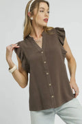 Light beige linen blouse with ruffle sleeves and button-down front, styled as a casual women's top by Trendsi.