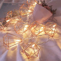Rose gold diamond string fairy lights with warm white LEDs, battery operated, perfect for decorative holiday or home accents.