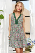 Front view of the Rosehaven Lace Garden Dress by Trendsi, featuring intricate lace details and a flowy, feminine design.