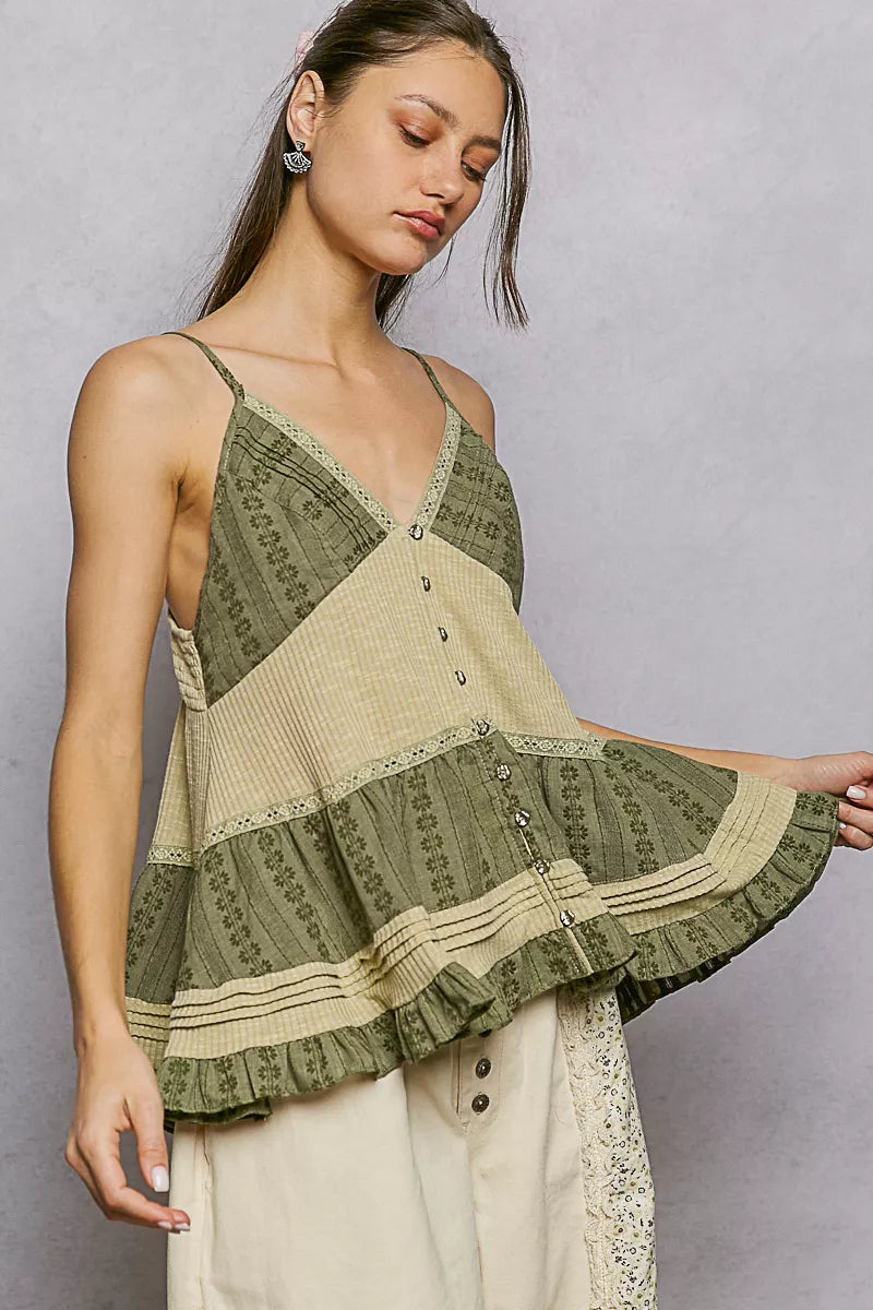 Pale sage green ruffled pintuck button-front cami blouse with side view, featuring delicate ruffles and a fitted silhouette.