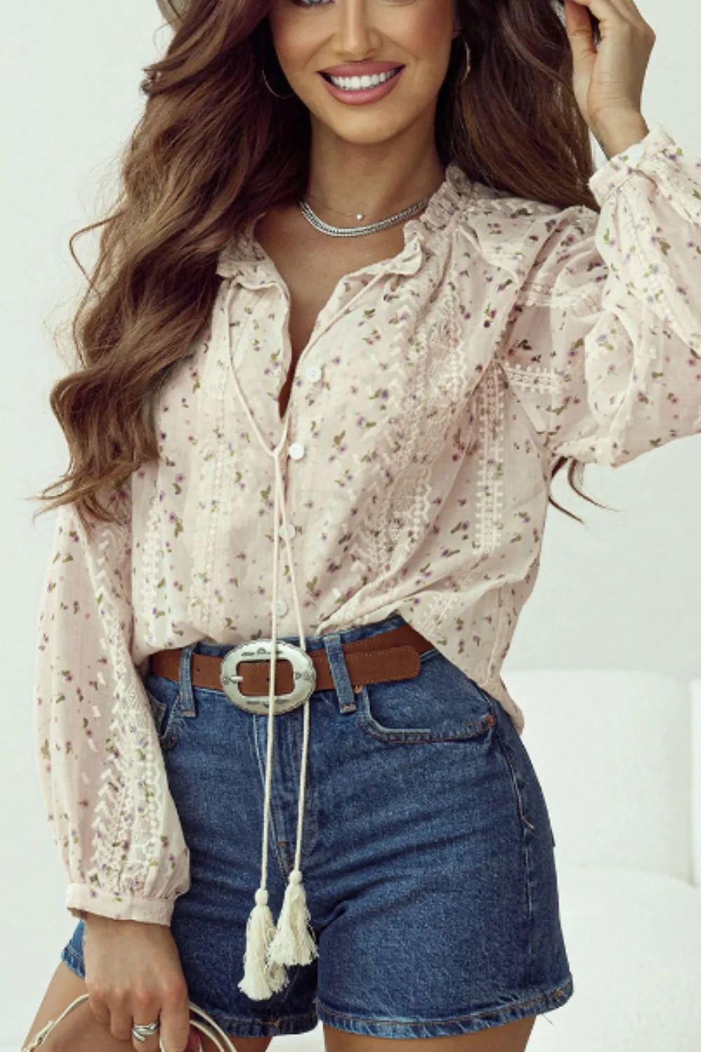 Front view of Trendsi Meadow Lace and Frill Tie-Neck Blouse with lace details and ruffled neckline.