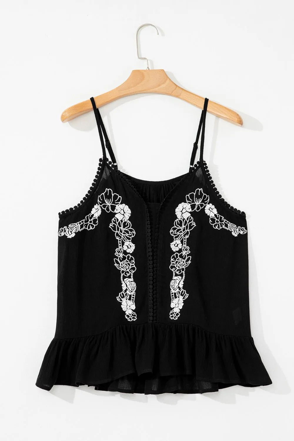 Embroidered Moonpetal ruffle cami blouse by Trendsi featuring delicate embroidery and ruffled neckline on soft fabric.