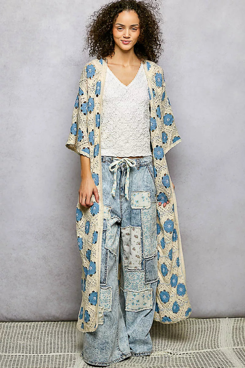 Rosehaven Crochet Garden Cardigan by Trendsi, close-up of soft, lightweight knit with floral crochet details and long sleeves.