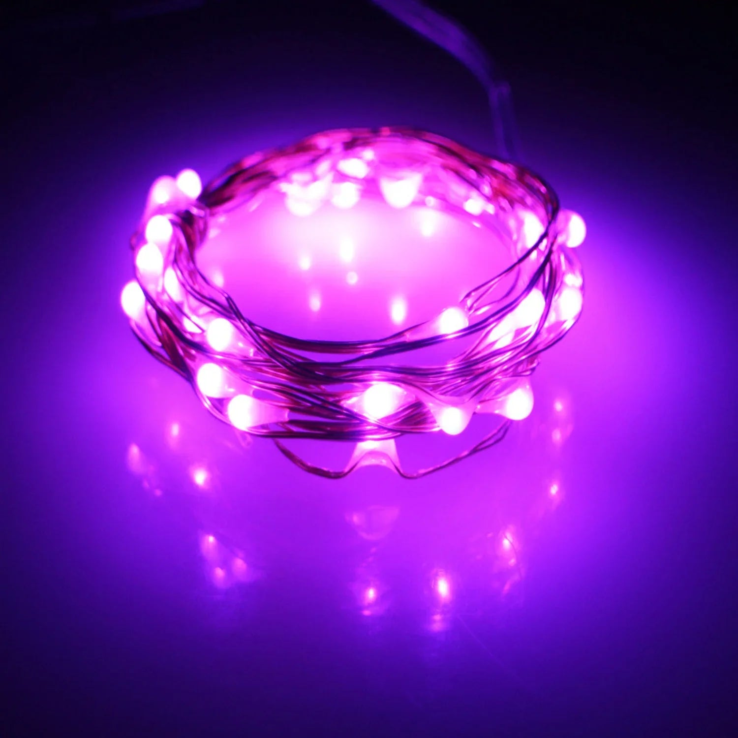 Pink glow 20 LED silver copper fairy lights by Perfect Holiday, battery-operated decorative LED string lights.