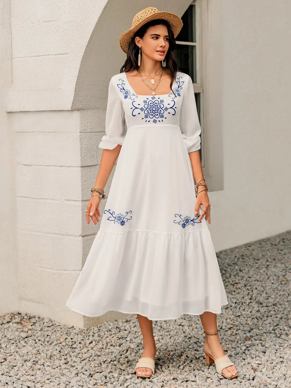 Front view of a Trendsi romantic floral square-neck balloon sleeve dress on a model, featuring a soft floral print and whimsical cottagecore style.