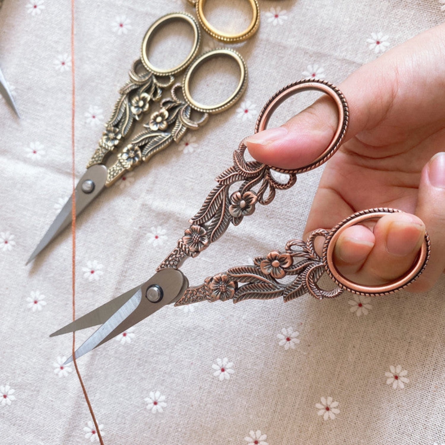 Rose gold vintage floral scissors with daffodil design, ornate craft and embroidery shears by 24 Hour Crafts.