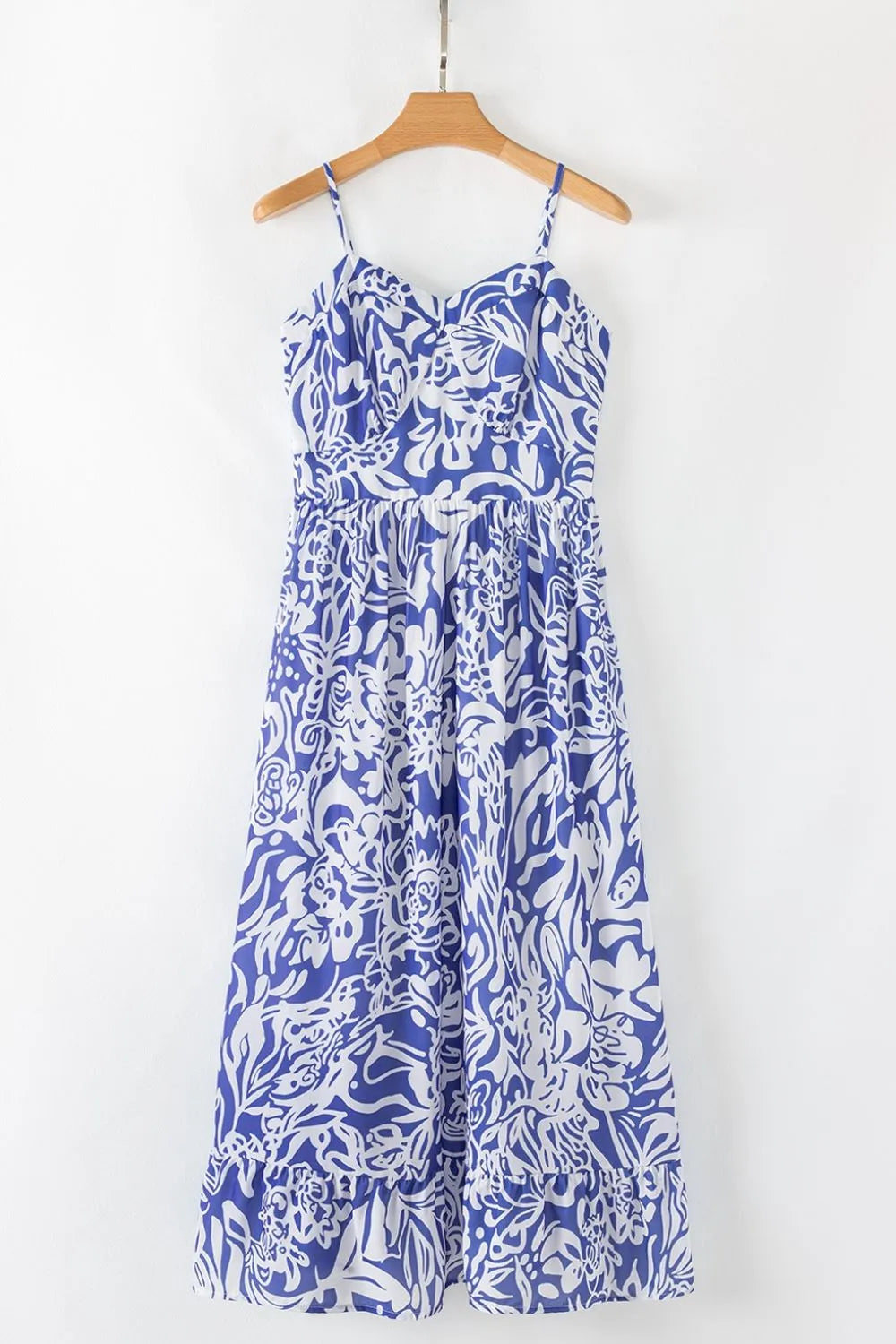 Bluebell Reverie sundress by Trendsi featuring whimsical spaghetti straps and a flowy front view, perfect for summer wear.